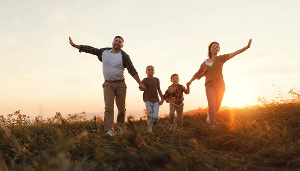 Happy Family Mother Father Children Son Daughter Running Nature Sunset Stock Picture