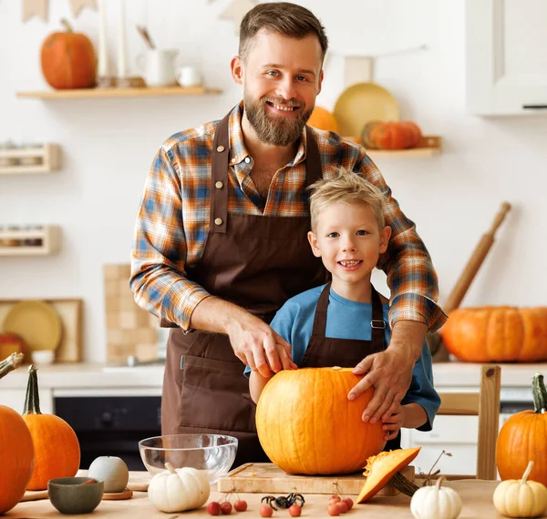 Cute Happy Little Boy Helping His Father Carve Halloween Pumpkin — Stock Photo, Image