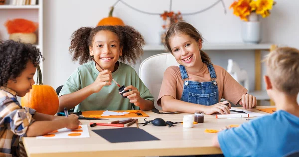 Happy Smiling Multinational Group Children Making Halloween Home Decorations Together — Stock Photo, Image