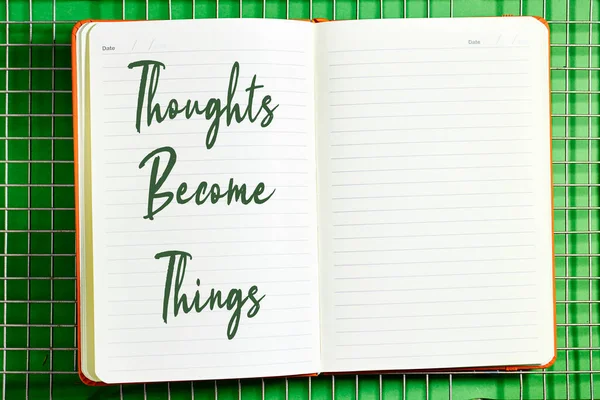 positive thoughts for self esteem building on notebook above fence background