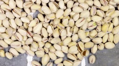 Fıstık deseni ve arka plan. Fıstık arkaplan olarak lezzetli şam fıstığı, şam fıstığı dokusu olarak. düz yat