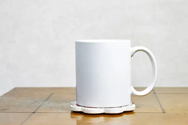 white coffee mug , white porcelain mug mock up on wood table