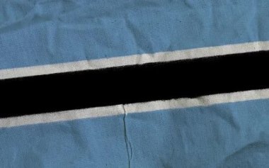 Cumhuriyet Botswana ulusal kumaş bayrağı tekstil arka planı. Dünya Afrika ülkesinin sembolü.
