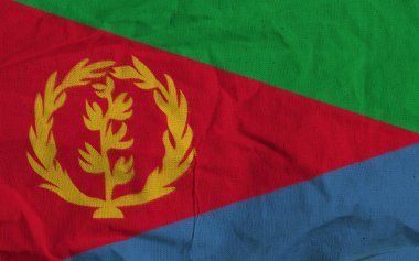 Kumaşta Canlı Renkleri ve Sembolik Amblemi Gösterilen Eritre Ulusal Bayrağı