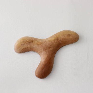 Vücut masajcısı Gua-sha. Vücut ve yüz için lenfatik drenaj. Konu fotoğrafı. Yüksek kalite fotoğraf