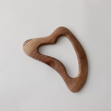 Vücut masajcısı Gua-sha. Vücut ve yüz için lenfatik drenaj. Konu fotoğrafı. Yüksek kalite fotoğraf