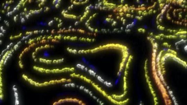 Siyah arka plan, parlak sarı ve yeşil arka ışık. Hareket. Canlandırma sırasında yanan parçacıklarla dolu parlak bir arkaplan. Yüksek kalite 4k görüntü
