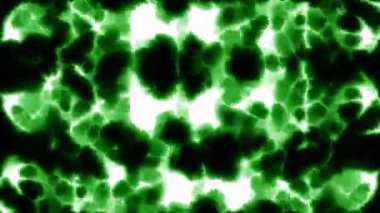 Turuncu ve yeşil arka plan. Hareket. Parlak yanan renkler, siyah arka planda yanarak yanar. Yüksek kalite 4k görüntü