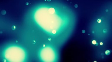 Soyut uçan üç boyutlu yuvarlak şekiller, tek renkli desenler. Hareket. Bokeh şekillerinin arkaplanı yavaşça taşınıyor