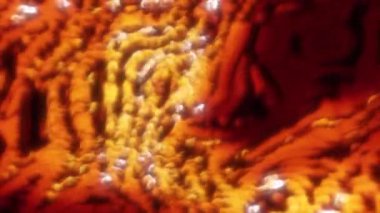 Yeşil ve turuncu arka plan. Hareket. İçinde bilgisayar grafiklerinden yapılmış beyaz boncuklar olan kaynayan bir kütle. Yüksek kalite 4k görüntü