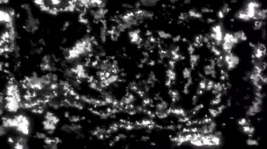 Beyaz ve turuncu parıltı. Hareket. Siyah arka plan, 3D animasyon ve parlak parlak röfleler. Yüksek kalite 4k görüntü