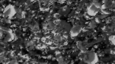 Gri ve turuncu simler. Hareket. Animasyonla yapılmış ışık parlatıcısı kararır ve parlar. Yüksek kalite 4k görüntü