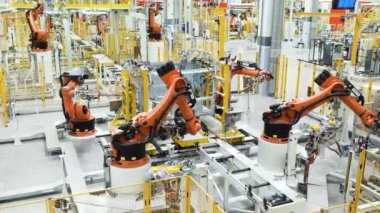 Berlin - Almanya, 6 Aralık 2022: Otomobil fabrikası, modern otomobil üretimi. Sahne. Robotlar iş başında, otomatikleştirilmiş üretim hattında süreç oluşturuyorlar