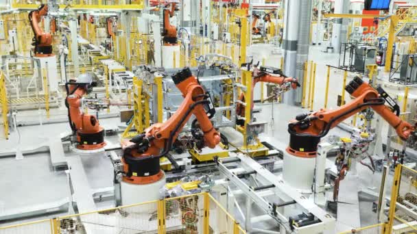 ベルリン ドイツ 12月6 2022 自動車工場 自動車の近代的な生産 シーンか 作業中のロボット 自動生産ラインでプロセスを構築 — ストック動画