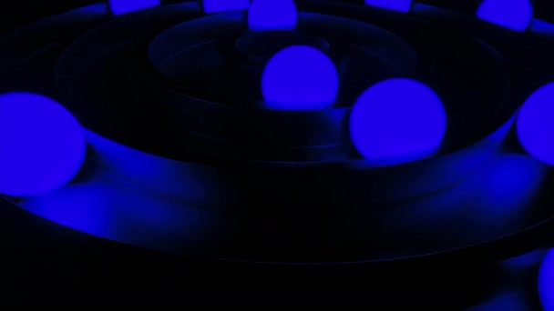 发光的球在3D环运动 旋转的3D球在黑暗中发光的圆形 发亮的球在圆圈中移动 — 图库视频影像