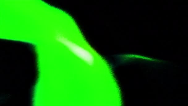 Grön Och Orange Spridande Ljusstråle Rörelse Svart Bakgrund Med Spelande — Stockvideo