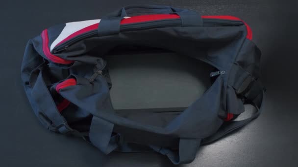 Athlete Puts Sneakers Sports Bag Clip Close Man Putting Sneakers — Stock Video