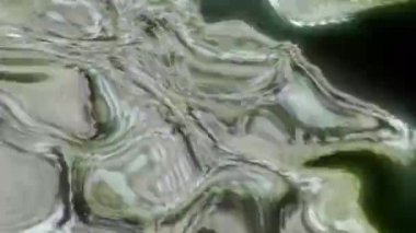 Dijital türbülans, yeşil renkli enerji dumanı bulutu. Hareket. Hızlı bir hareketle dalgalanan animasyon 