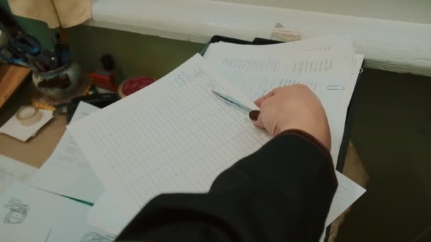Elderly Woman Takes Notes Laboratory Clip Female Dispatcher Uniform Writes — Stock Video