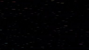 Siyah ve mavi arka plan. Tasarım. Soyutlamayla yapılmış küçük, parlak parçacıklar uçuyor. Yüksek kalite 4k görüntü
