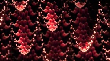 Soyut sıvı su damlaları siyah arkaplandaki şelale gibi görünüyor. Tasarım. Küçük parçacıkları üçgen şeklinde hareket ettiriyor