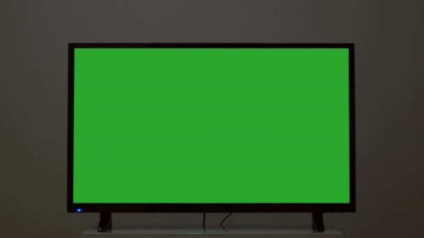 Плазмовий Телевізор Зеленим Екраном Стоїть Фоні Стіни Поняття Зелений Екран — стокове відео