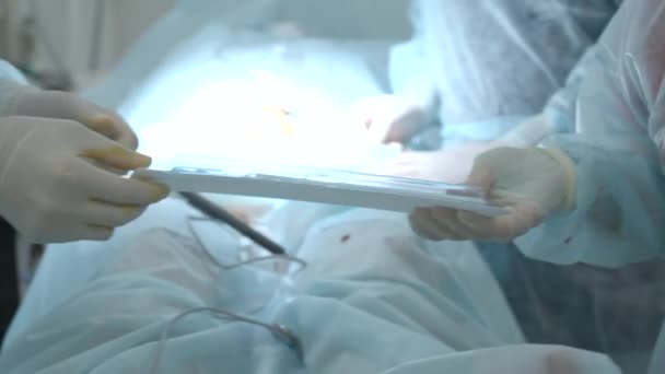 Nurse Passing Disposable Sterile Kit Doctor Operating Room Action Concept — Stock Video