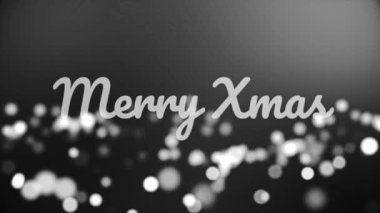 Monochrom Merry Noel yazıt çok bulanık, siyah ve beyaz zemin üzerine yuvarlak ışıklar, kutlama ve kış tatil kavramı. Sparkles uçan ile neşeli Noel ifade