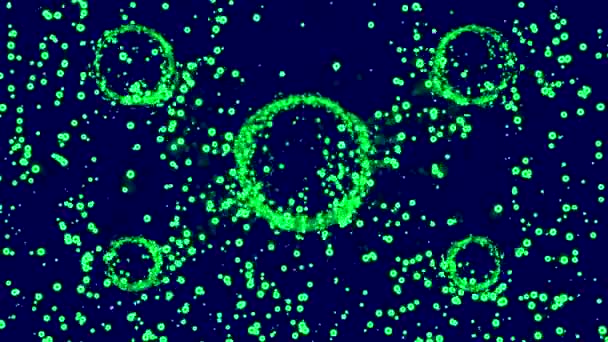 循环背景动画 绿色微粒和环状物质 — 图库视频影像