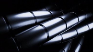 Soyut tasarım, akış çizgileri neon ışıklarıyla aydınlanan karanlık bir zemin. Tasarım. Dönen bükülmüş borular