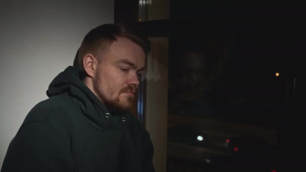 Sad Man Night Window House Media Man Looks Out Window — Stockvideo
