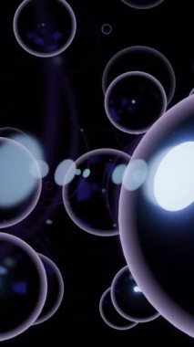 Siyah arka plan. Tasarım. Animasyondaki büyük beyaz kabarcıklar farklı yönlere dağılır. Yüksek kalite 4k görüntü