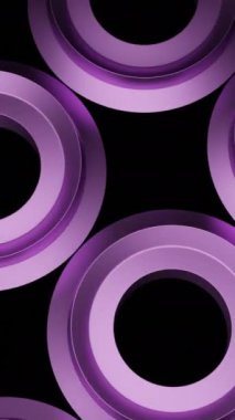 Hipnotik etkisi olan üç boyutlu halkalar. Tasarım. Üç boyutlu fındıklar siyah arka planda titreşiyor ve hipnotize oluyor. Metalik parıltılı fındık ya da halkalar hipnotize edici bir şekilde döner..