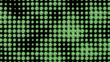 Bright green roundels .Design.Bright green little light bulbs that sparkle in abstraction. High quality 4k footage clipart