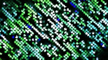 Disko tarzında renkli noktaların hareketli çizgileri. Hareket. Renkli parlak noktalar arka planda çizgiler halinde hareket eder. Dönen nokta çizgileri ile disko topu biçimi animasyonu.