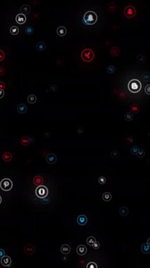 Sadece yazı işleri için. Soyut renkli popüler sosyal medya simgeleri siyah arkaplanda kameraya doğru akmakta, kusursuz döngü. Animasyon. Farklı sosyal ağ logoları.