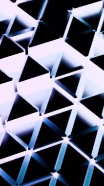 Görsel olarak çarpıcı soyut bir tasarım. Bu desenler, canlı renklerde gösterilen üçgen desenleri gösteriyor.