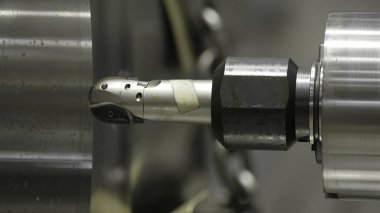 Hassas makine yapımında kullanılan, olağanüstü endüstriyel işçilik sergileyen bir fabrika aletini kapatın. Menkul Kıymetler