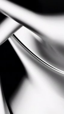 Zarif ve görsel olarak çarpıcı soyut bir görüntü. Siyah ve beyaz dokular zarifçe akıyor.