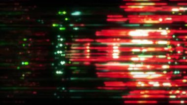 Bu dinamik soyut sanat eseri kırmızı ve yeşil ışık çizgilerinin canlı bir karışımını sergiliyor.