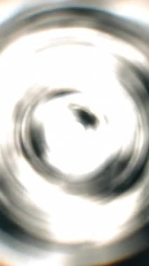 Akışkan girdap desenleri çeşitli yaratıcı projeler için büyüleyici ve büyüleyici bir soyut arkaplan oluşturur.