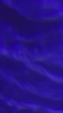 Pürüzsüz mavi sıvı hipnotik eşmerkezli daireler oluşturur.