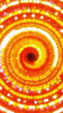 Büyüleyici ve büyüleyici bir spiral desen parlak kırmızı ve sarı renkli ışıklar yayıyor.
