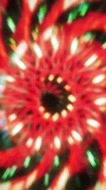 Canlı ve güzel soyut bir kırmızı ve yeşil Noel ışıkları karanlık bir ortamda parlıyor.