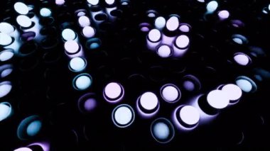 Siyah bir zemin üzerinde hareket eden birçok parlak küre