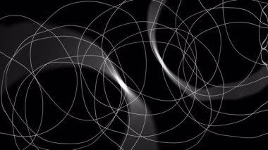 Siyah arkaplanda dönen beyaz çizgiler soyut ve dinamik bir görsel oluşturur
