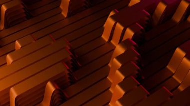 Turuncu metalik kurdeleler sallanıyor ve büyüleyici bir soyut manzara yaratıyor. Tasarım