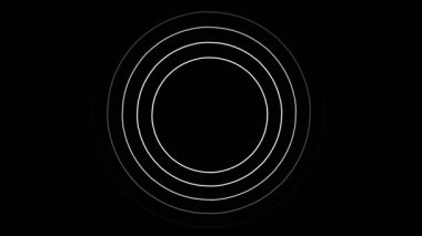 Eşmerkezli beyaz çemberler siyah arkaplanda genişliyor