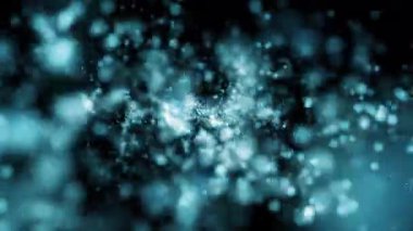 Cyan parçacıkları siyah arkaplanda yavaşça hareket ediyor.