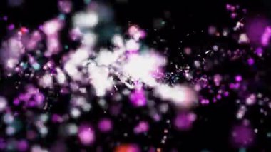 Siyah zemin üzerinde dönen ve hareket eden mor ve beyaz parçacıklar soyut ve dinamik bir görsel oluşturur